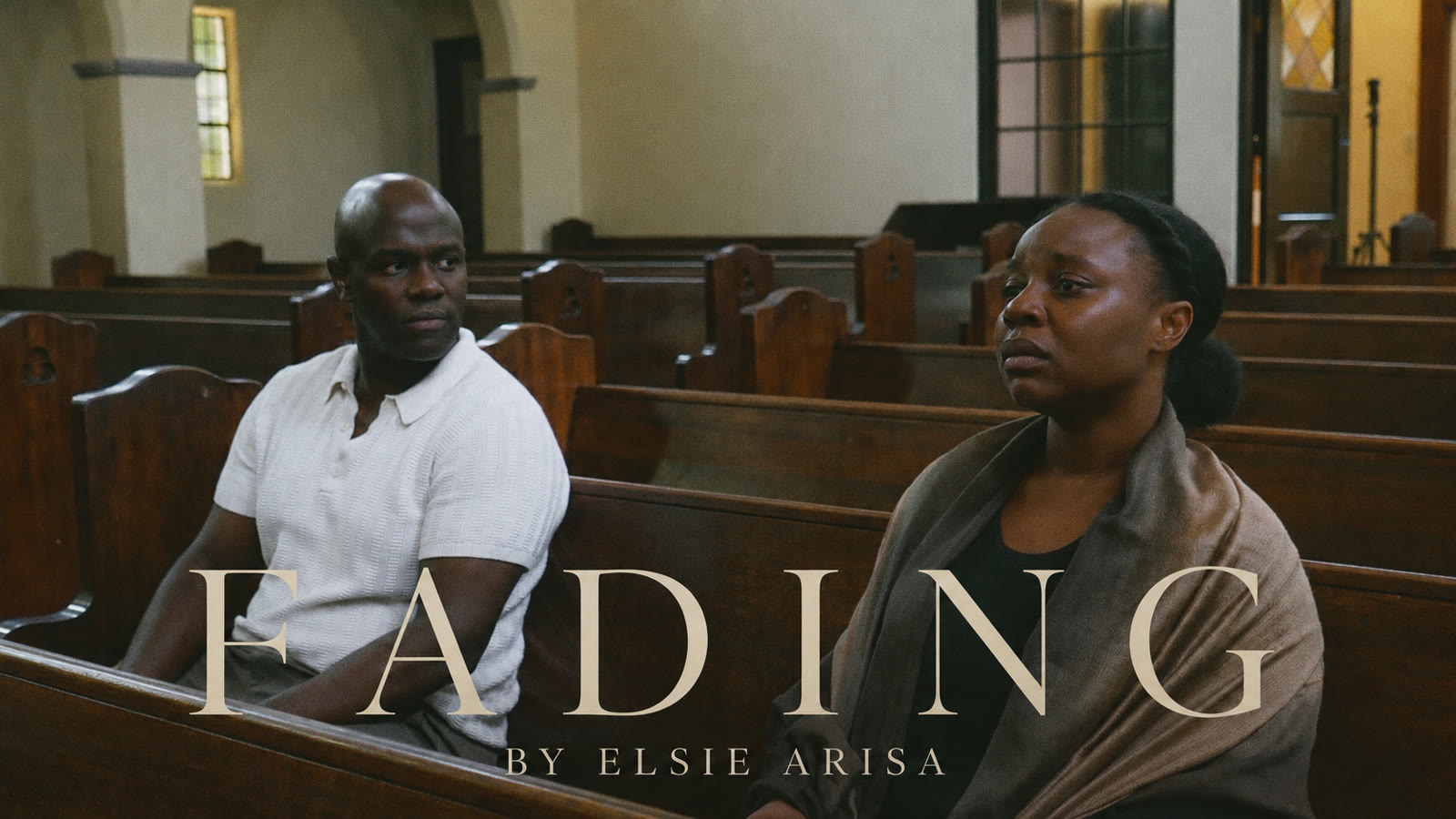 FADING by Elsie Arisa — a couple seated together in a church pew